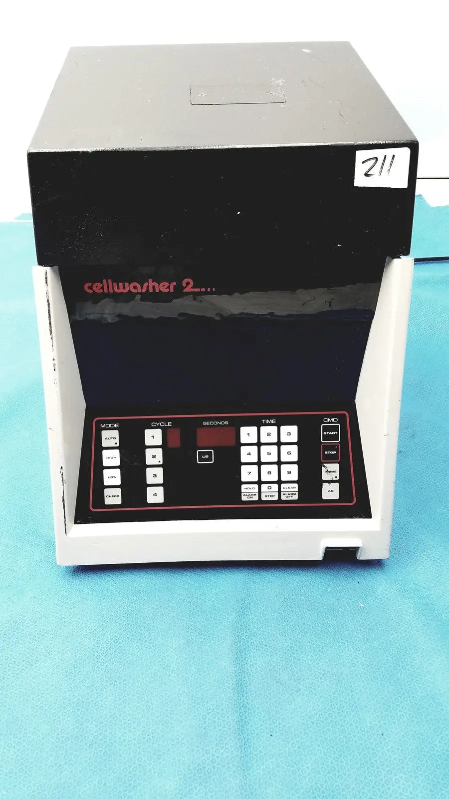 Black and white Sorvall cell washer machine with red labeling for centrifuge cell washing at 3600 RPM