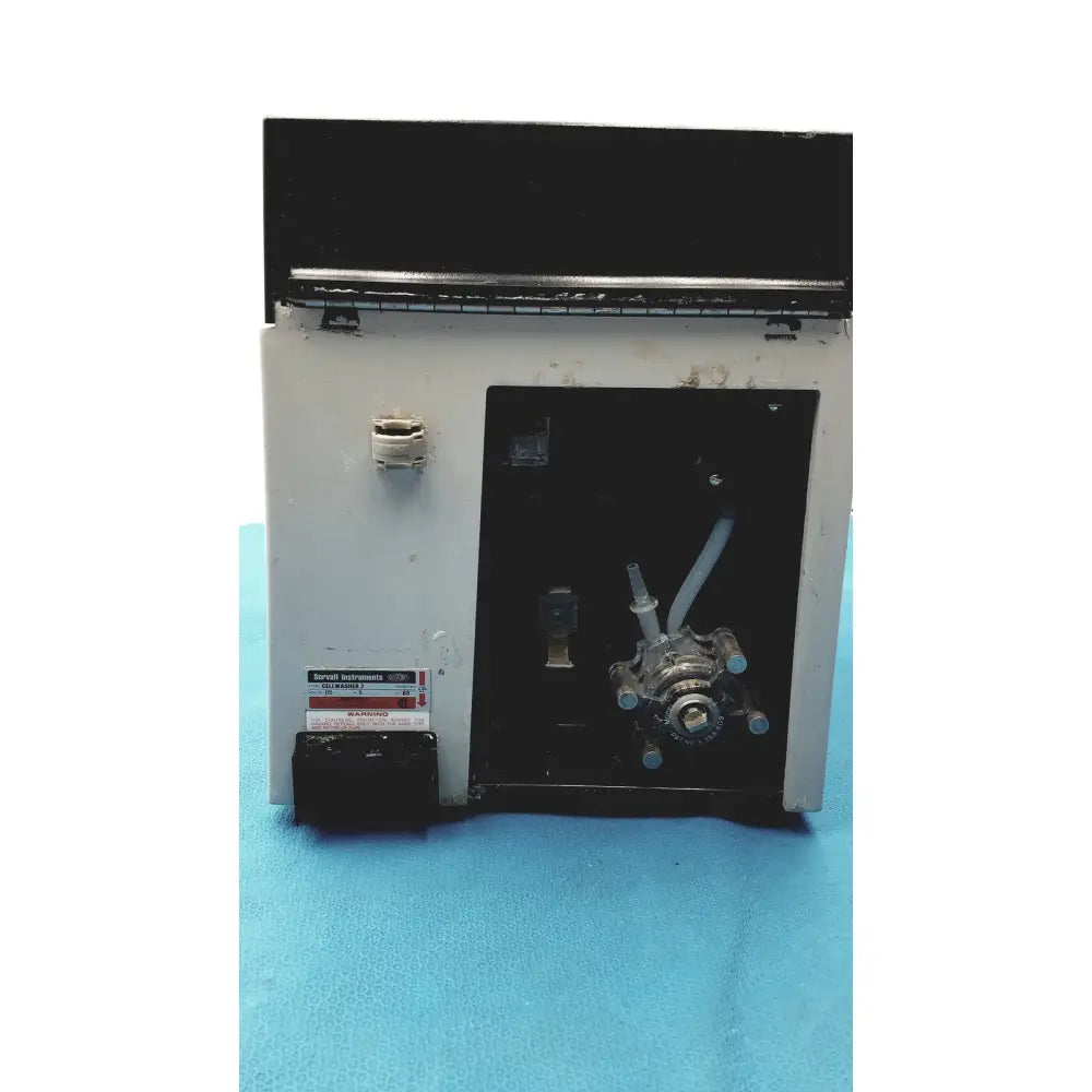 White and black sorvall instruments cell washer with metallic pump assembly for laboratory use