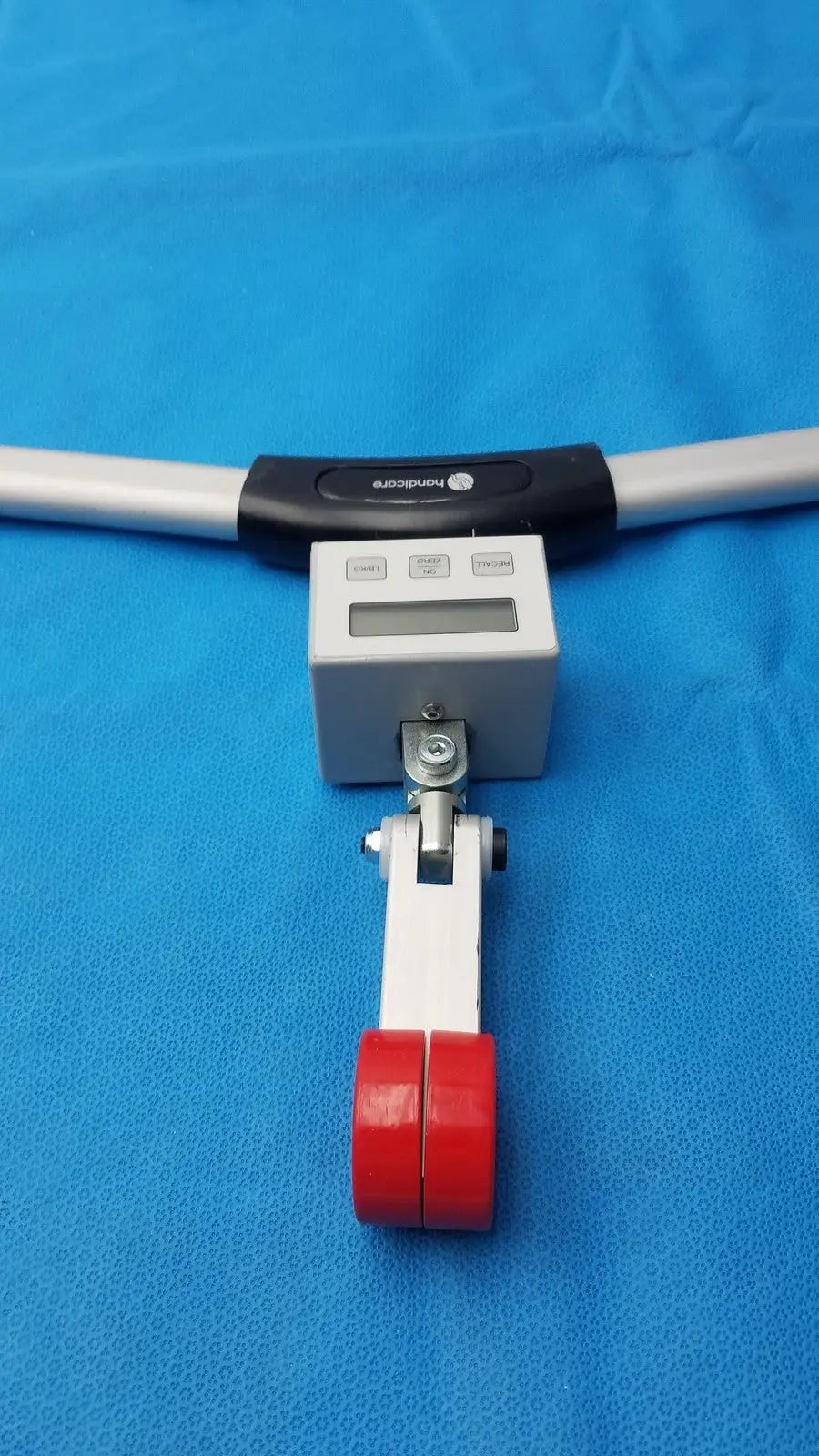 Silver and black digital force gauge with red rubberized grips surgical instrument made in germany model ssi 15-3309