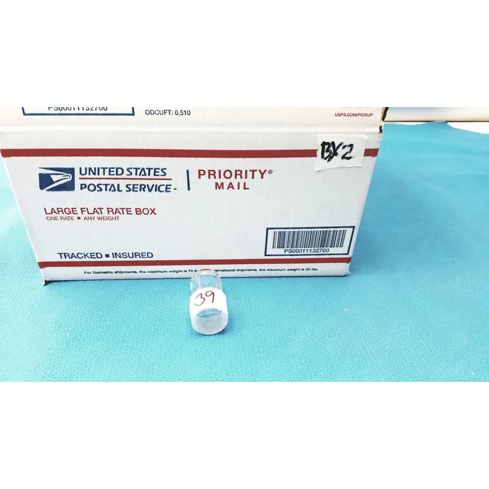 Clear plastic vial with white cap and red handwritten 39 number for standard taper hollow ground glass stopper plug