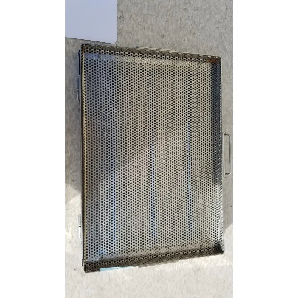 Rectangular stainless steel sterilization case tray with perforated surface and two side handles for surgical instruments