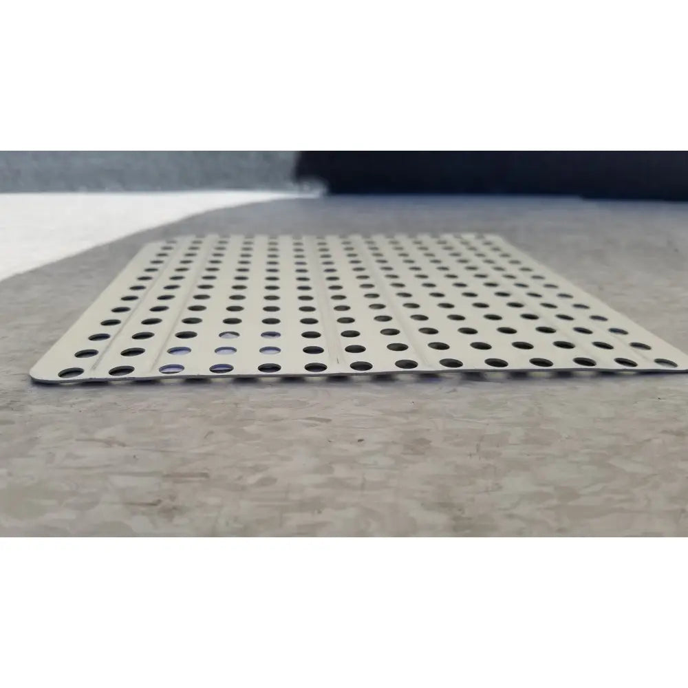 Silver perforated metal sterilization container inserts f170 with evenly spaced circular holes for secure ventilation