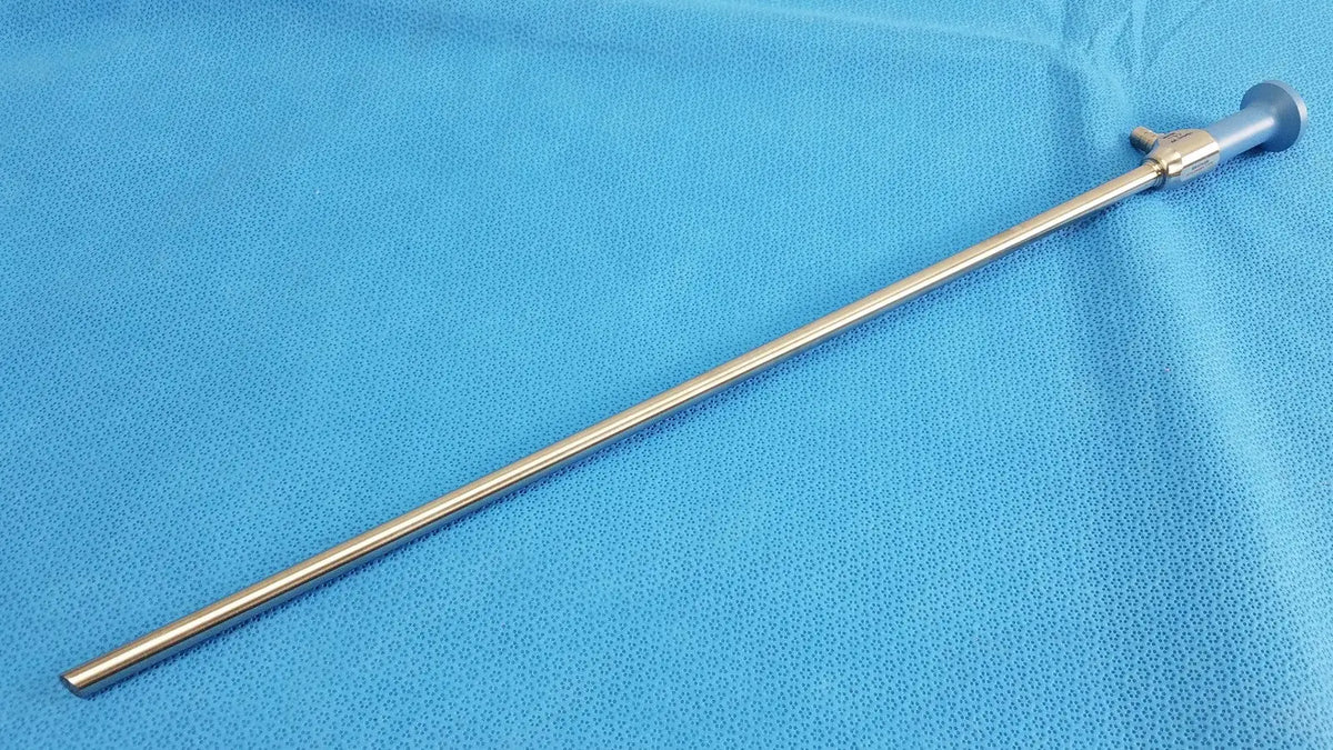 Silver surgical endoscope with slender metallic shaft and rounded handle ideal eyes 10mm autoclavable with trey