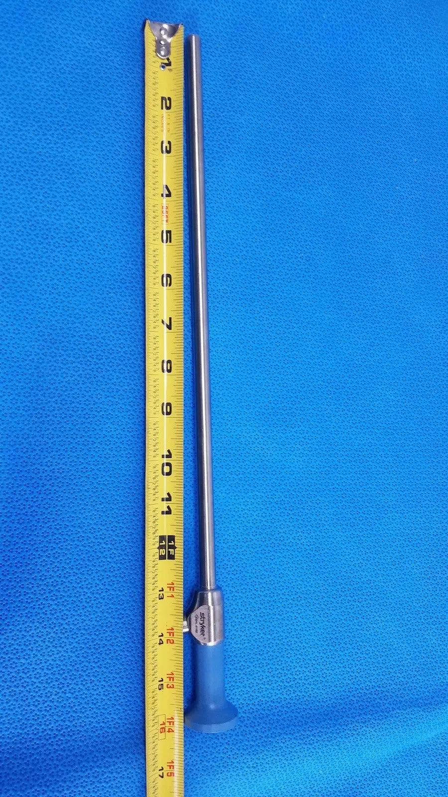 Silver surgical endoscope with blue handle and measurement markings ideal eyes 10mm autoclavable by stryker