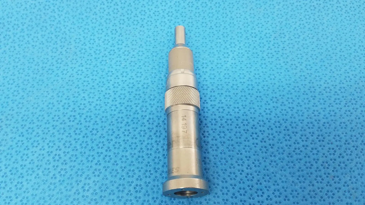 Silver-colored metal series straight micro surgical drill with textured grip and engraved markings for orthopedic use