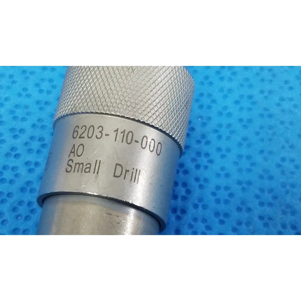 Stryker 6303-110-000 silver metallic small drill with textured grip and engraved model number for reuse medical use