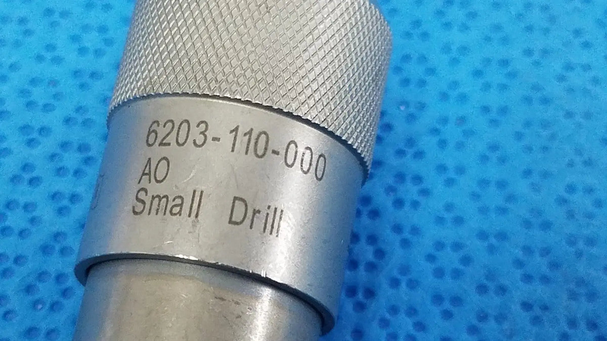 Stryker 6303-110-000 silver metallic small drill with textured grip and engraved model number for reuse medical use