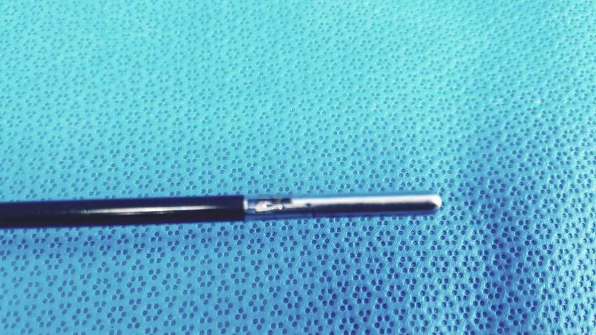 Stryker fenestrrated delicate grasper black and silver medical catheter with smooth tapered tip for precise handling