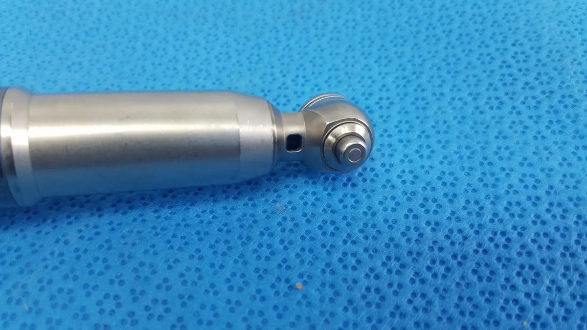 Silver surgical drill bit with polished metallic finish and precision-engineered rounded tip for stryker remb electric sagittal saw