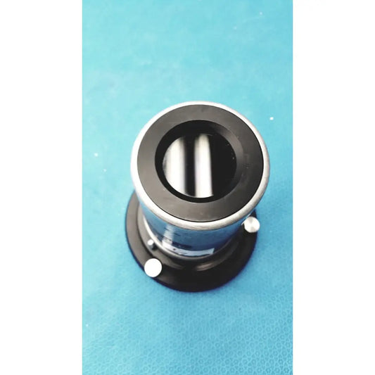 Black and silver cylindrical stryker strykecam 2 in- light camera with reflective interior for medical imaging