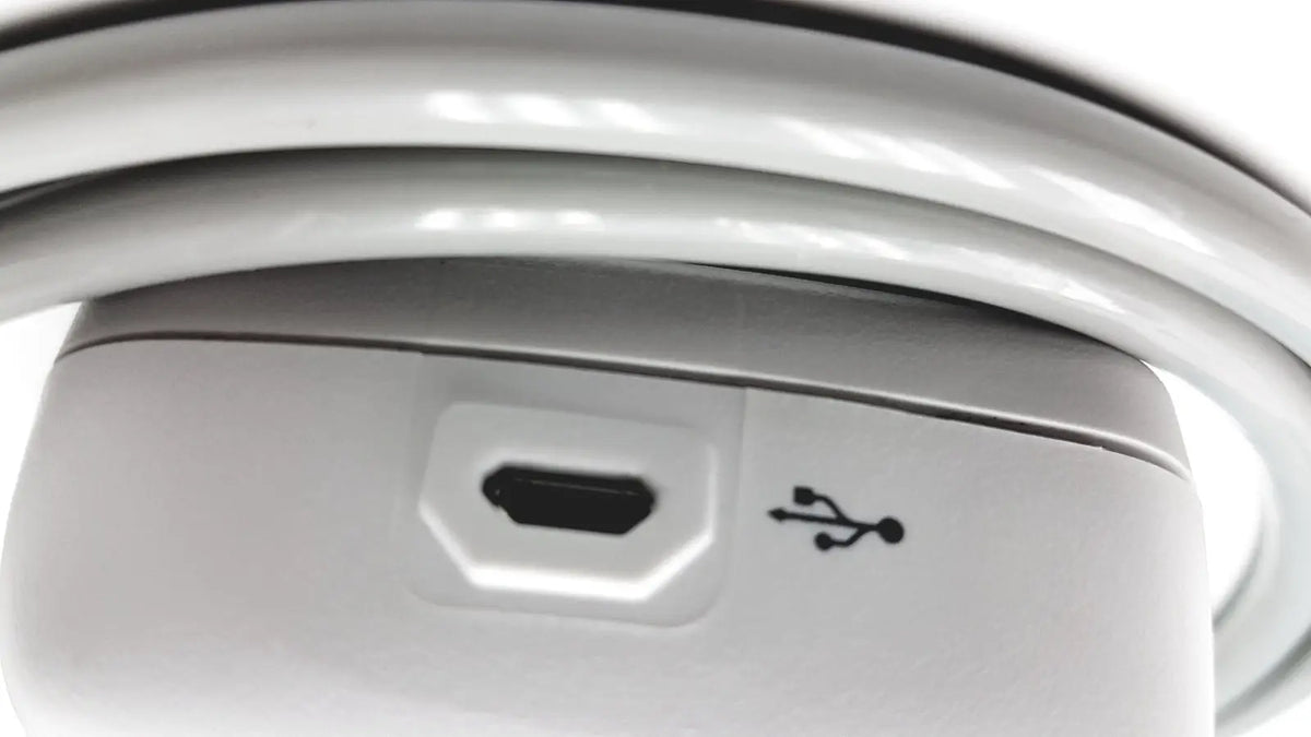 White usb-c charging cable with sleek coiled design for suntech medical oscar 2 ambulatory blood pressure monitor system