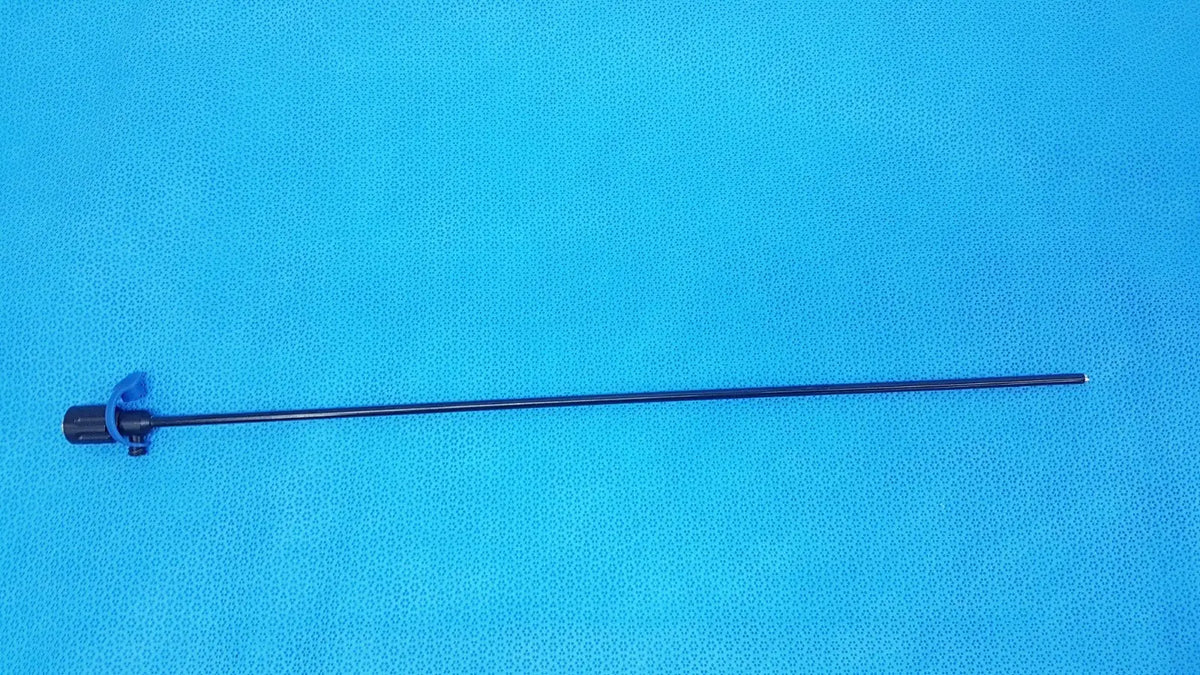 Black surgical cannula sheath with luer lock and blue plastic clamp near handle for secure connection