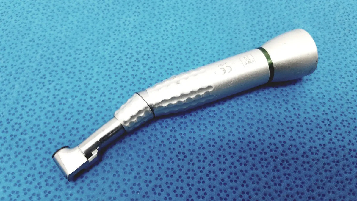 Silver SybronEndo 18:1 axxess spring-head handpiece with textured grip and black accent ring for dental use