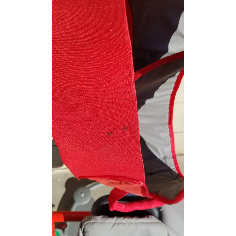 Red fabric strap with textured weave and stitching for romedic return7500 sit stand manual lift aid system romedic return7500 sit stand manual lift aid