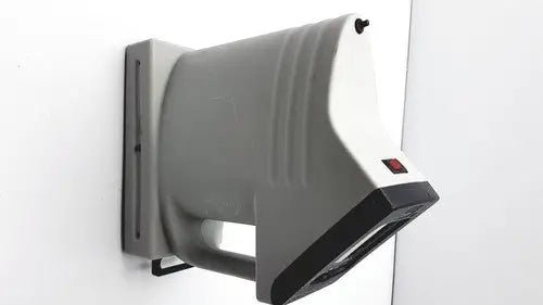Gray and white wall-mounted x-ray machine with black accents in thermo electron handecount portable sample counter