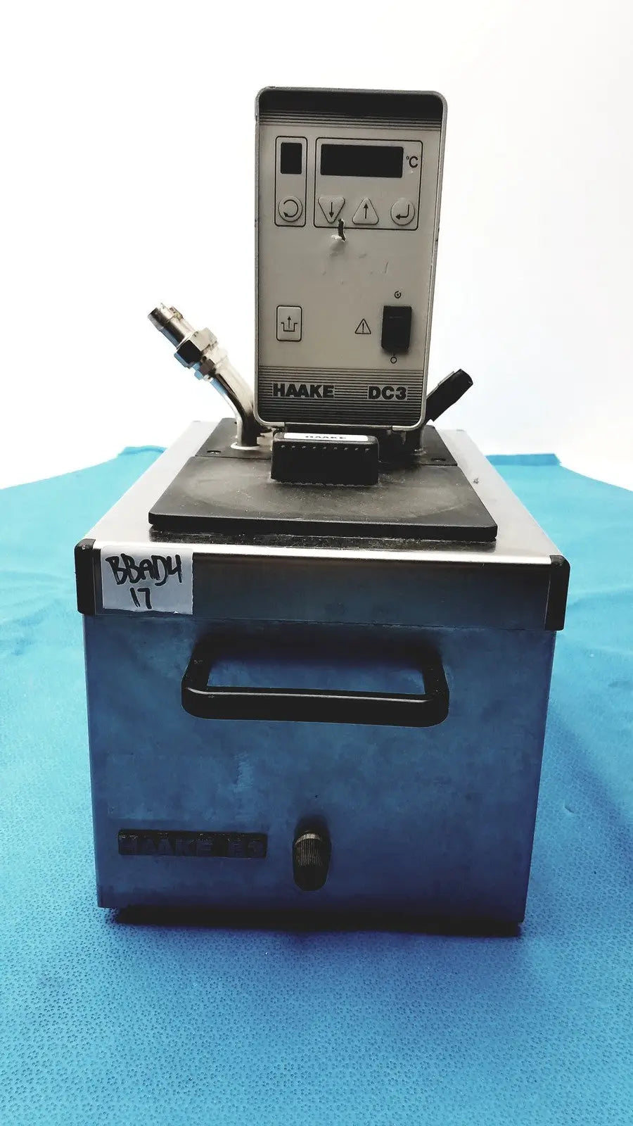 Silver and black thermo haake dc3 heating circulator bath with digital display and front handle for precise temperature control