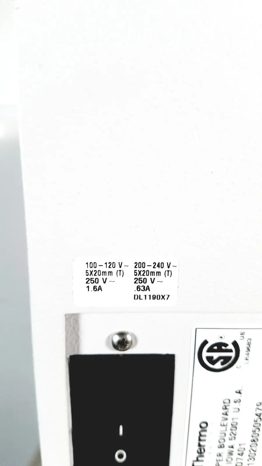 White thermostatic control panel with black power switch and voltage label on thermo scientific easypure ii d7401 lab grade filter