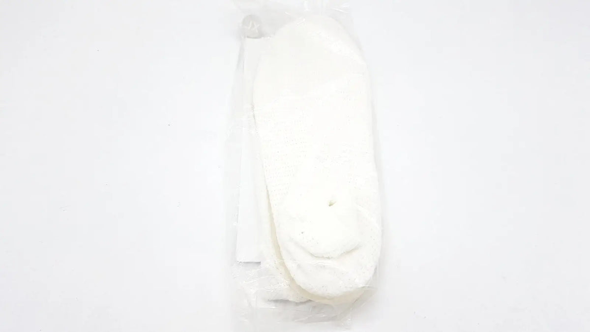 White ankle socks neatly packaged in clear plastic for tidi posey quick dry slippers size XL with non skid rubber sole