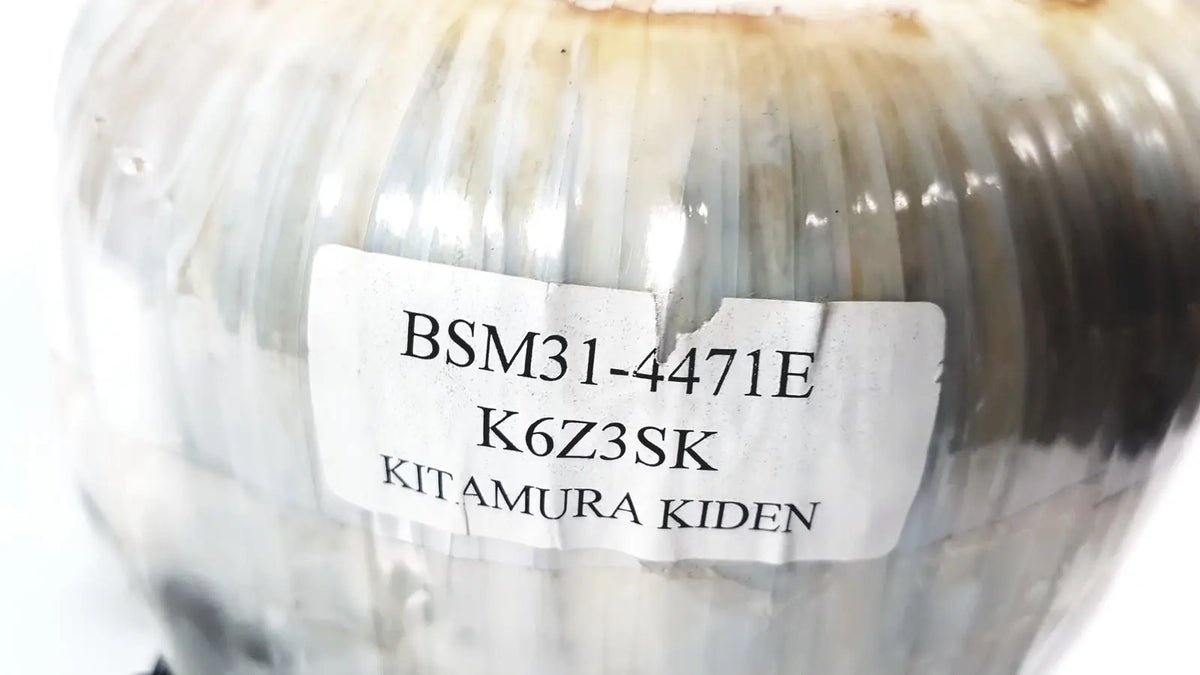 A translucent ribbed glass jar with faint brownish discoloration for toshiba transformer bsm31-4471e xario ultrasound