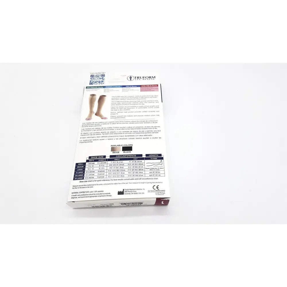 White cardboard shoe box with black and gray text showing truform leg health medical compression thigh high stockings black unisex
