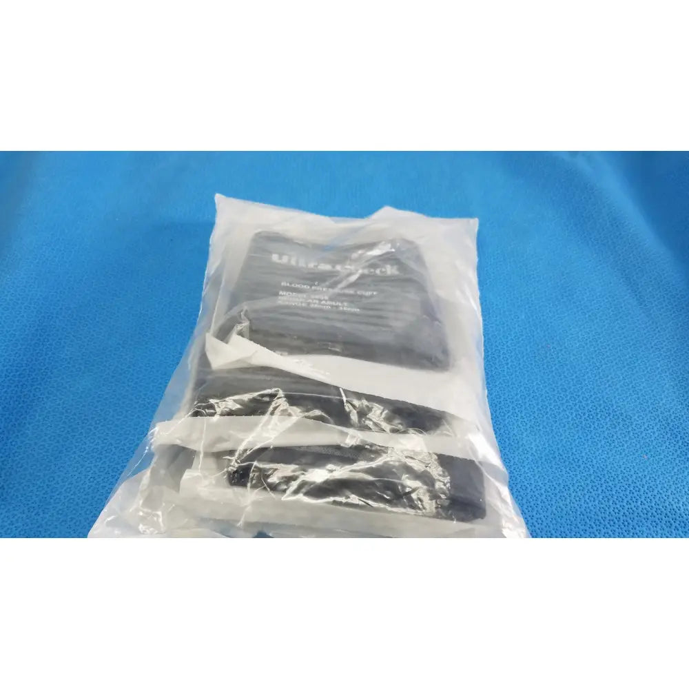 Black ultrapack ultracheck blood pressure cuff adult single tube with HP fitting packaged in clear plastic with specs