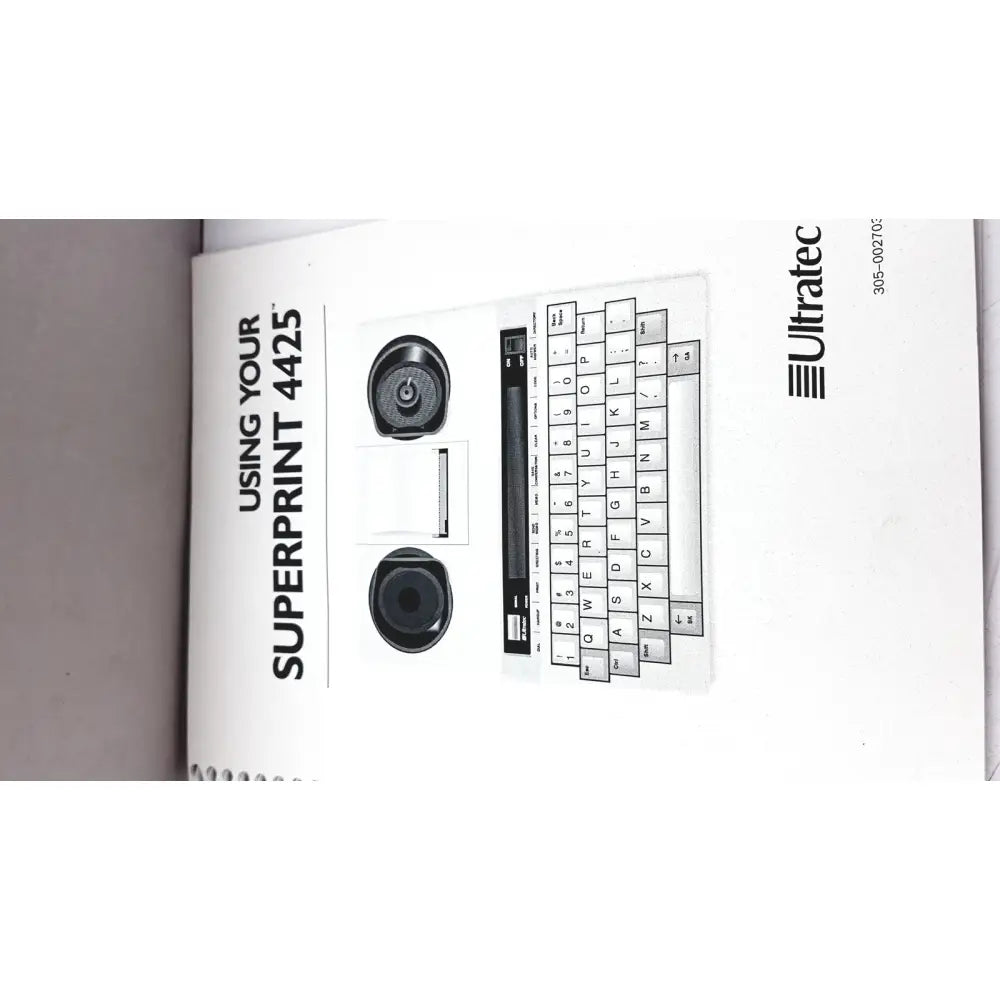 Black ultratec superprint 4425 telephone printer tty with keyboard and dual circular speakers on front panel