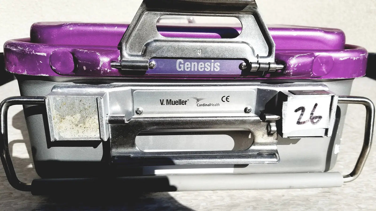 Purple and silver genesis carefusion sterilization container with sturdy metal handle and side grips 5 inches deep