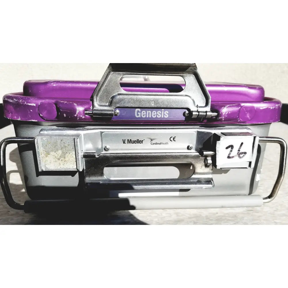 Purple and silver genesis carefusion sterilization container with sturdy metal handle and side grips 5 inches deep