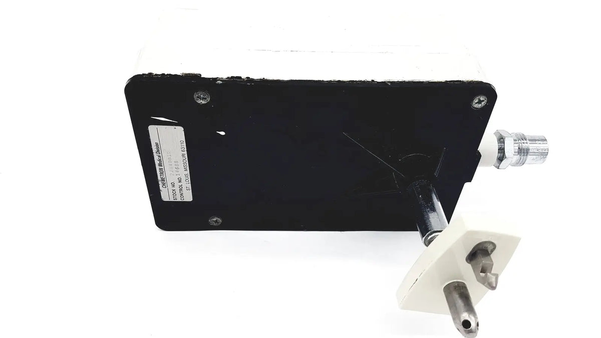 Black rectangular electrical control box with white plug and metallic connector for vacutrol health care sugrical use