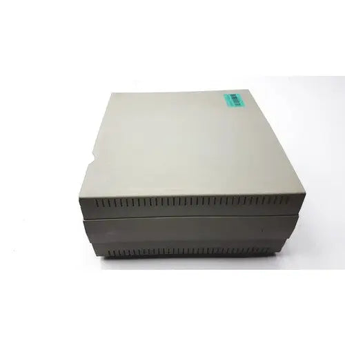 Beige plastic vasamedics laserflo blood perfusion monitor with dark gray base and ventilation slits along bottom edge