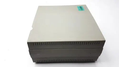 Beige plastic vasamedics laserflo blood perfusion monitor with dark gray base and ventilation slits along bottom edge