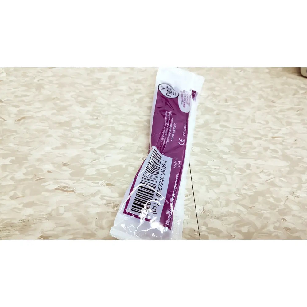 A purple and white packaged verathon bladderscan bvi 6100 handheld bladder scanner medical device