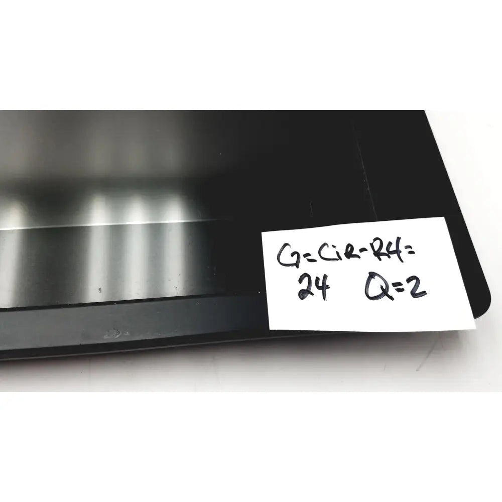 Black wacom cintiq 21ux graphics monitor with a handwritten note attached to its side for creative use