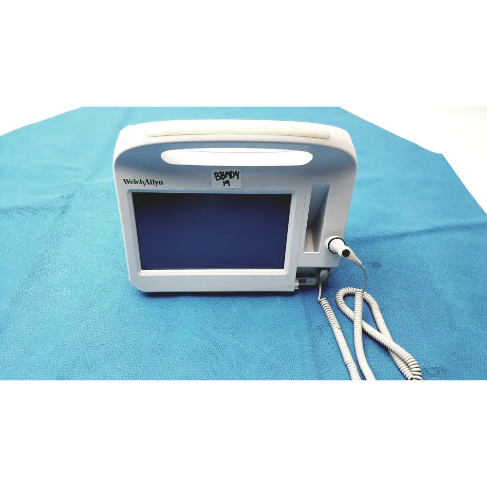 White Welch Allyn B-90 portable vital signs monitor with rectangular screen and coiled cable for connex vital signs monitoring