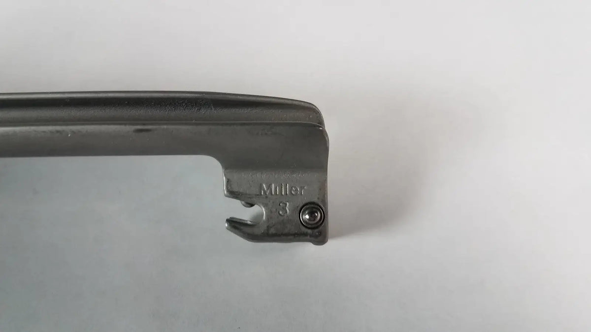 Black metal welch allyn laryngoscope blade miller size 3 with sharp angled edge and engraved branding