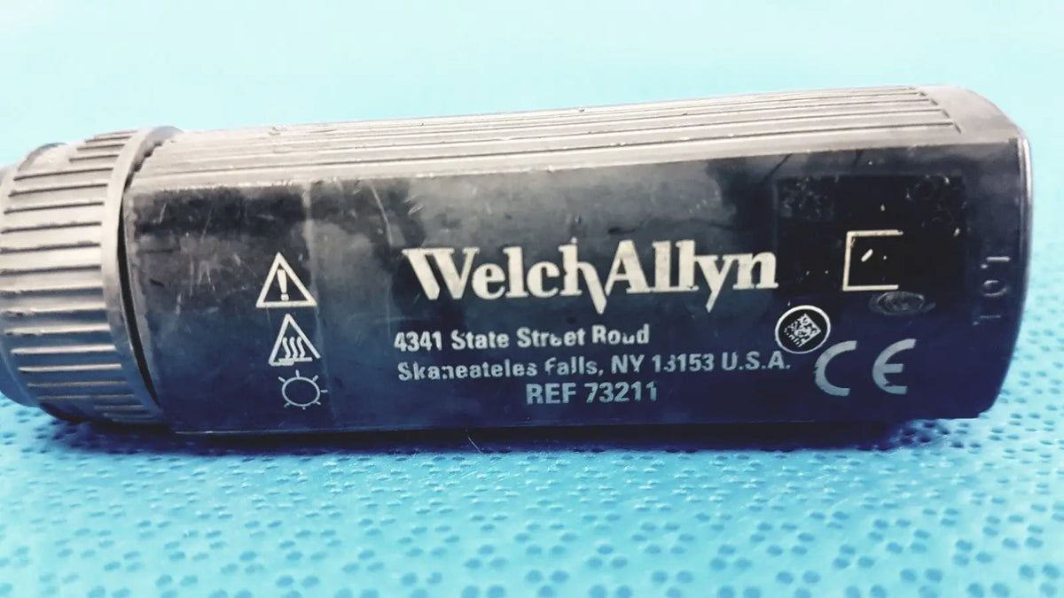 Black welch allyn rectal light handle with ribbed texture and printed labeling for medical examination illumination