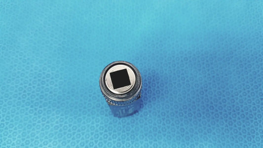 Silver-colored metal socket wrench with square drive opening for welch allyn rectal light handle medical examination illumination