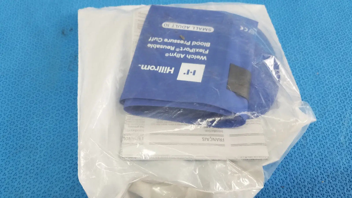 Welch Allyn 901043 small adult blue Hillrom blood pressure cuff packaged in clear plastic with white paper insert