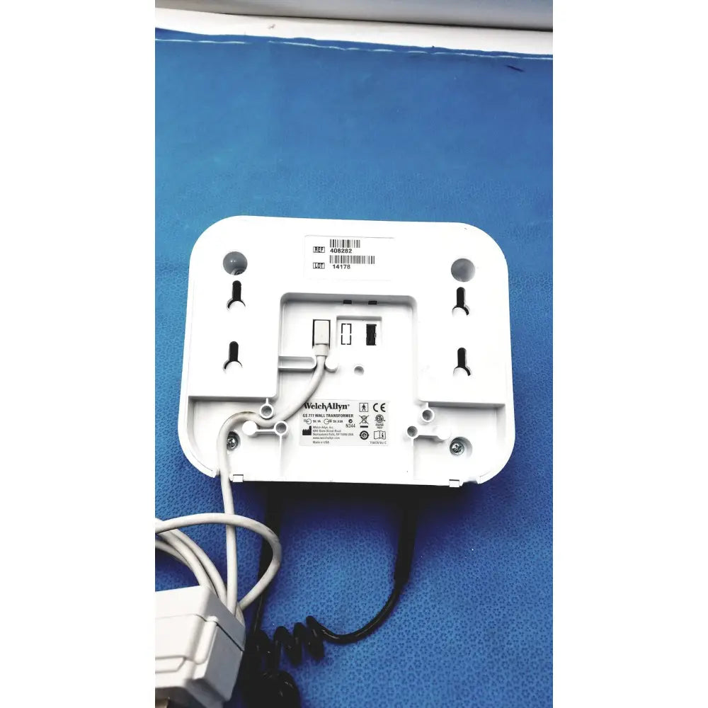 White plastic welch allyn gs 777 wall transformer with ophthalmoscope otoscope wireless coiled cable and power adapter