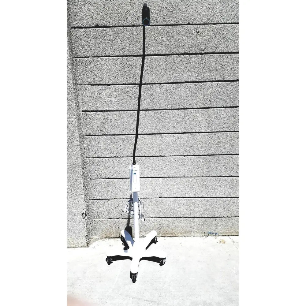 White welch allyn gs exam light with adjustable arm and black cord for medical examination lighting