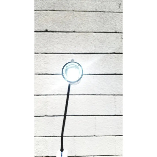 Welch Allyn GS exam light IV circular bright white LED fixture with clear glass cover and black cord for medical use