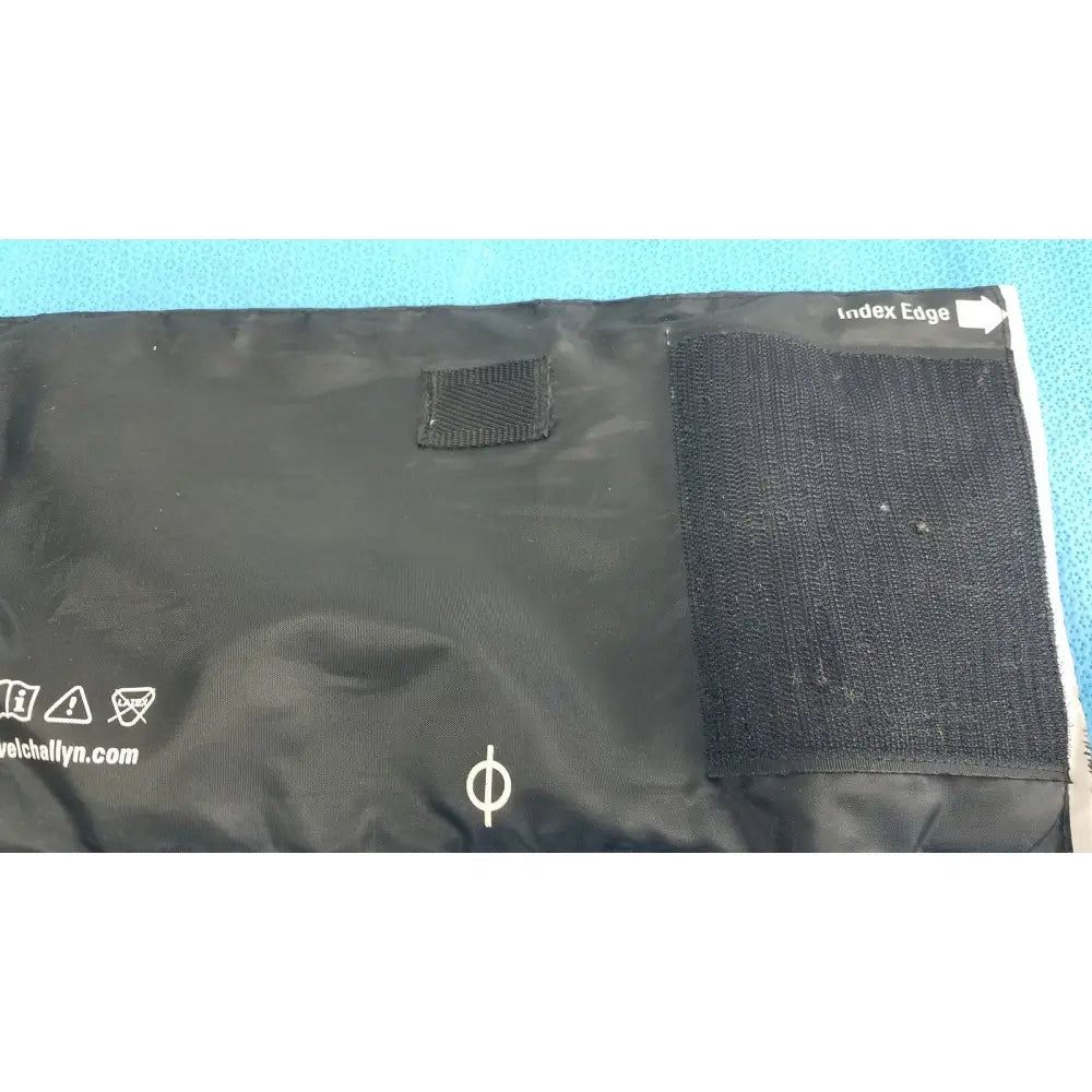 Black fabric pouch with velcro closure and white text for Welch Allyn large adult blood pressure cuff accessory