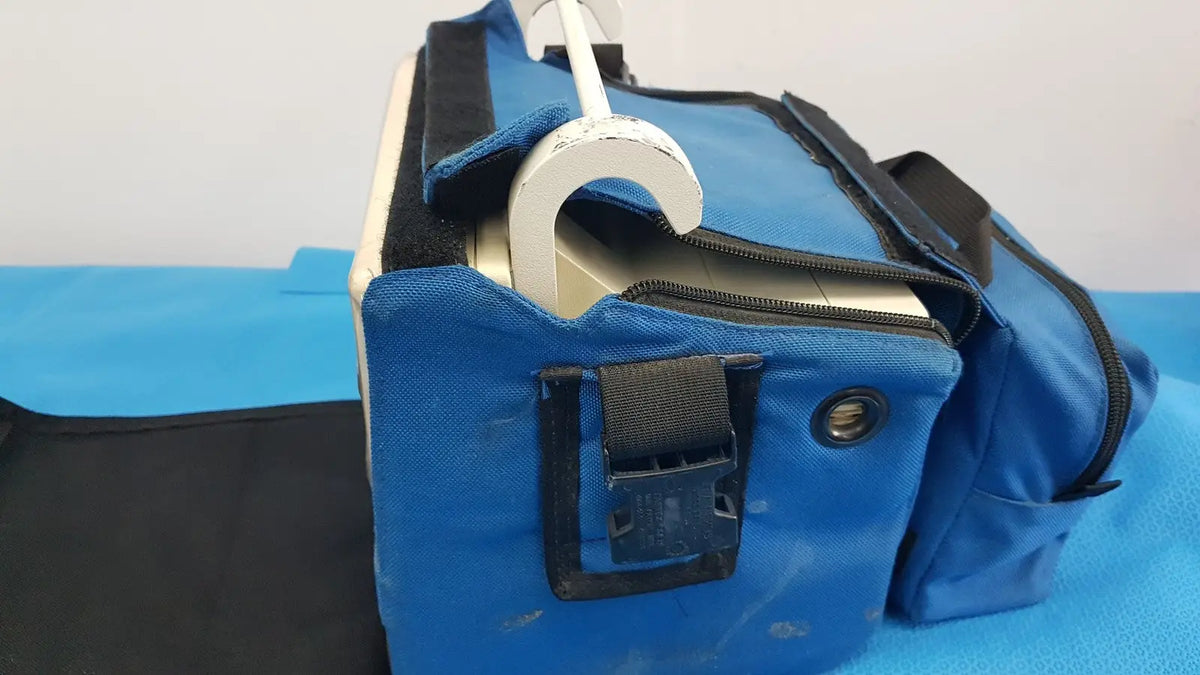Blue fabric tool bag with black trim and white plastic hook for welch allyn propaq encore 202 el patient monitor