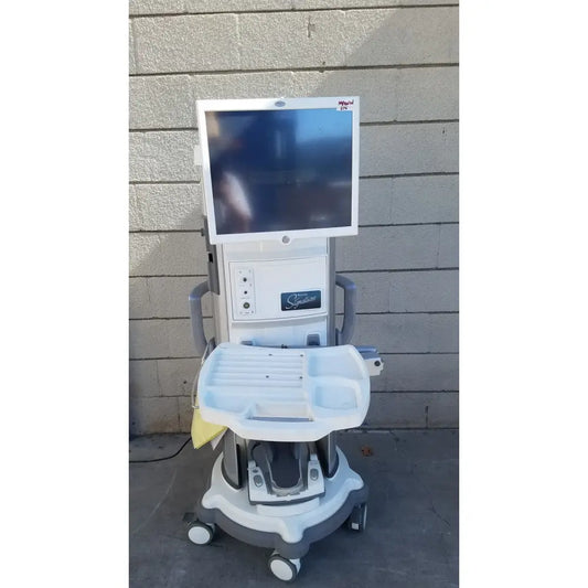 White and gray medical cart with touchscreen monitor and supply tray for whitestar signature phacoemulsifier with footswitch