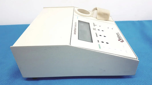 White rectangular ultrasound therapeutic device with digital display and control buttons by integra for clinical use