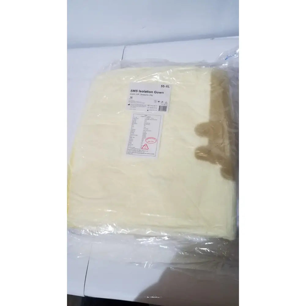 A pale yellow xiantao 55-xl sms isolation gown made of polypropylene with elastic cuff and ultrasonic seal in clear packaging