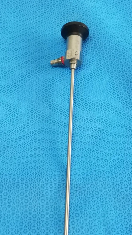 Silver xomed sharpsite autoclavable endoscope with black circular cap and metallic joints for reuse medical applications