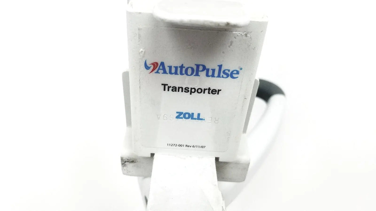 White plastic zoll autopulse resuscitation system with blue and black branding and rolling stand for emergency use