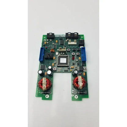 Green control panel encoder board with black connectors red coils and central processor chip for GE 9800 C-Arm system