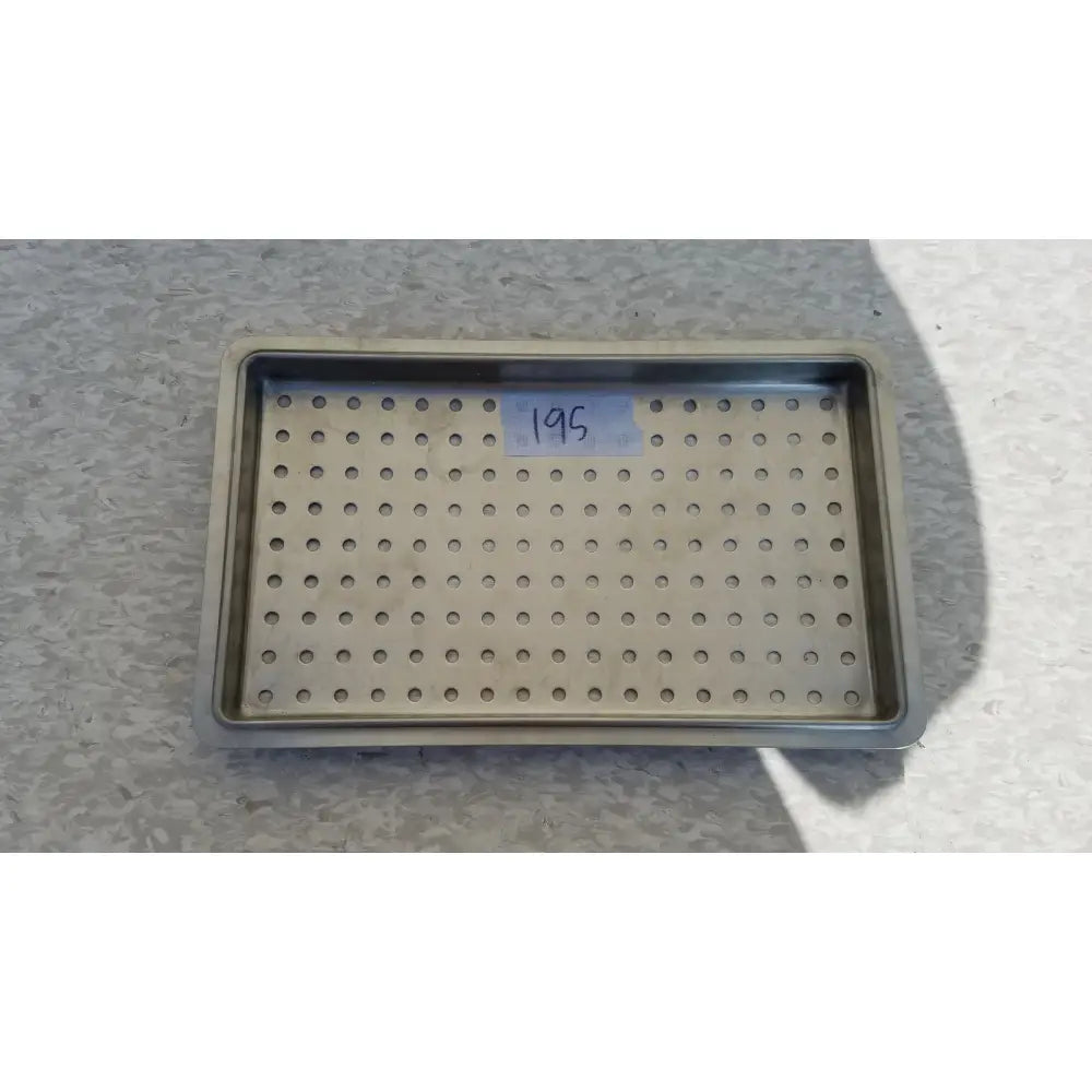 Rectangular stainless steel tray with circular holes for 1 layer of instrument sterilization case use